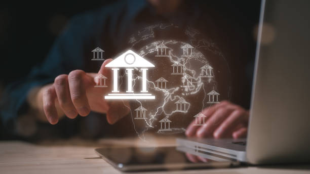 istock E-governance technology, Businessman holding virtual glob and the e-governance icon on the global network structure. Ensuring secure e-governance of business in the era of global connectivity 2167215669