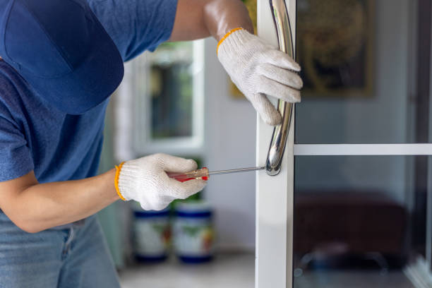 istock Worker install handle on aluminium swing door. 2167217124