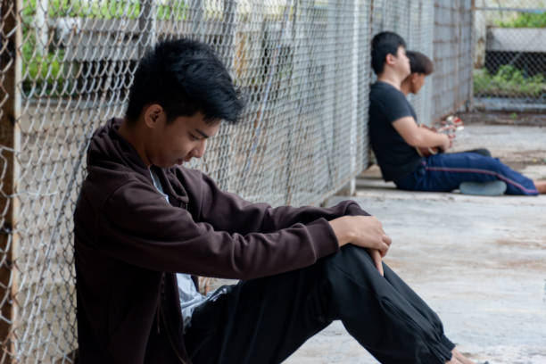 istock Asian boy in poor school detention center 2167219246
