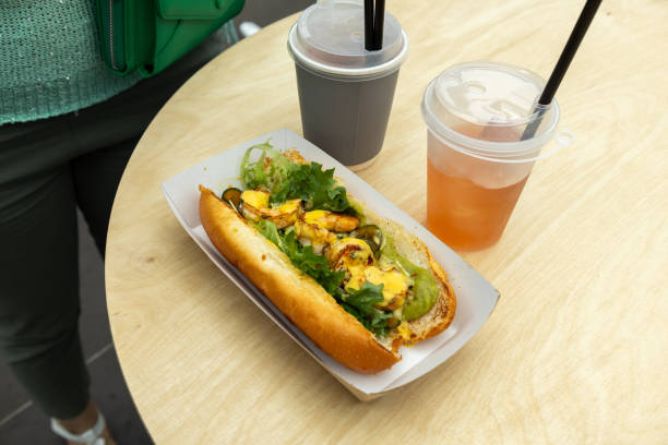istock Shrimpdog with hot drinks on a street table 2167220399