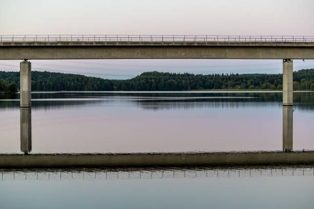 Stockholm, Sweden A reflection of a subway bridge over the Albysjon, or Alby Lake.
