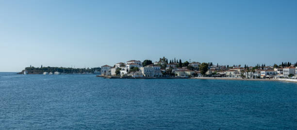istock Spetses island, Greece. Seafront buildings view from the sea 2167223017