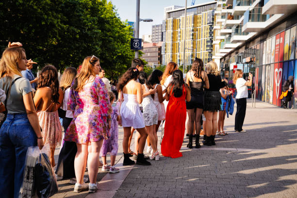 Wembley Park Boulevard London HA9, Brent, United Kingdom – On August 17, 2024 — Wembley Park - Wembley Stadium daytime summer time in the northwest of Central London.\n\nOn the Spanish Steps, people take photographs during event days of Taylor Swift's concerts. a focal point for fans. the steps have been temporarily renamed the Swiftie Steps to celebrate her Eras Tour in London. a significant influx of fans, contributing to the local economy. the enthusiastic engagement of attendees capturing photos at this iconic site.