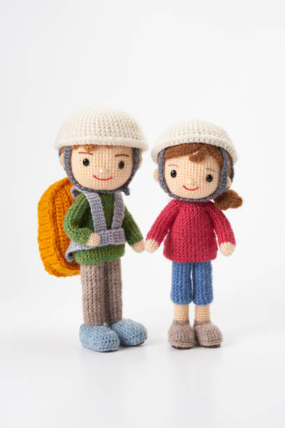istock Small and cute Amigurumi doll on white background.Disaster prevention training 2167224486