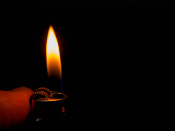 istock The lighter produces a spark, creating fire. Symbol of danger, potential explosion and fire. Ideal for warnings 2167227192