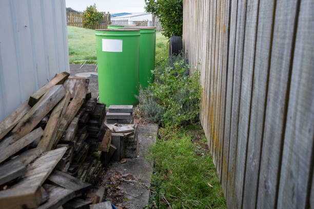 istock Abandoned Timber and Steel Drums in Garden 2167228572
