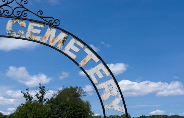 istock Cemetery entryway in a metal arch 2167229374