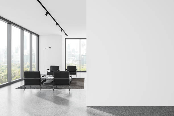 istock Modern office waiting room with black chairs and a cityscape view, on a spacious white wall background. Reception area concept.  3D Rendering 2167229843