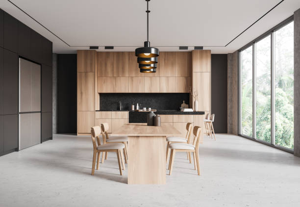 istock Home kitchen interior with eating table and cooking cabinet. Panoramic window 2167230845