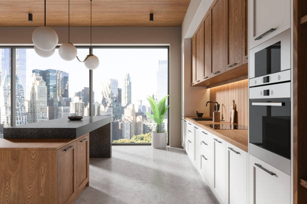 istock Elegant home kitchen interior with bar counter and cooking cabinet, window 2167231077