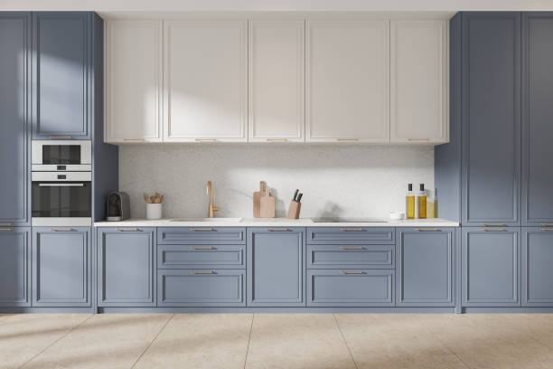 istock Stylish home kitchen interior with cooking cabinet on tile concrete floor 2167231394