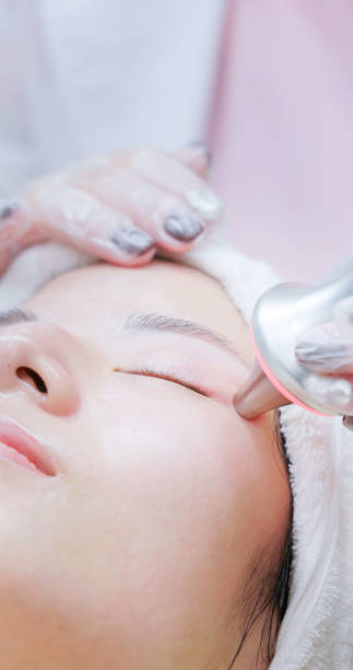 istock asian beautician use beauty device 2167233925