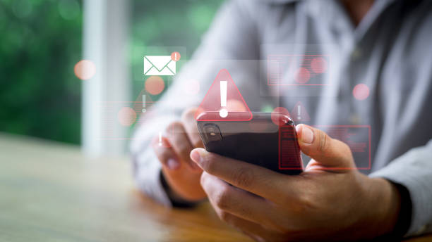 istock Emergency warning alert alarm on Smartphone, Email inbox alert and spam virus with warning, email security protection alert, Data network protection, Virus alarm. 2167233946