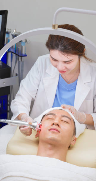 istock asian beauticians use beauty device 2167234354