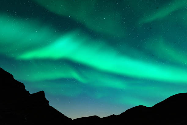 istock Northern lights in winter mountains 2167236833
