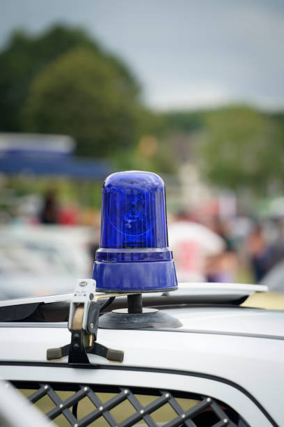 istock Blue signal light on a car top 2167236893