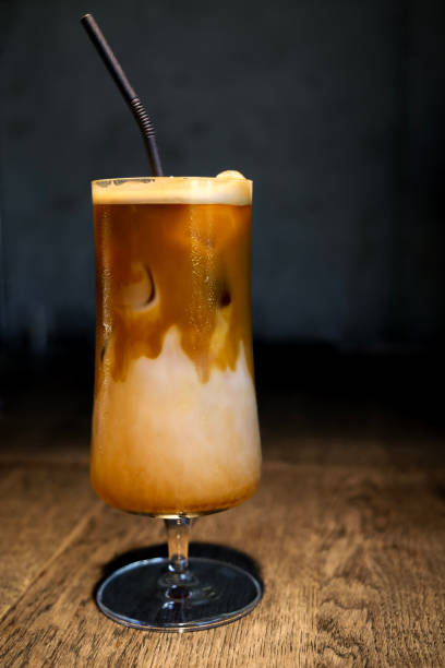 istock Ice coffee with straw in a glass 2167236990