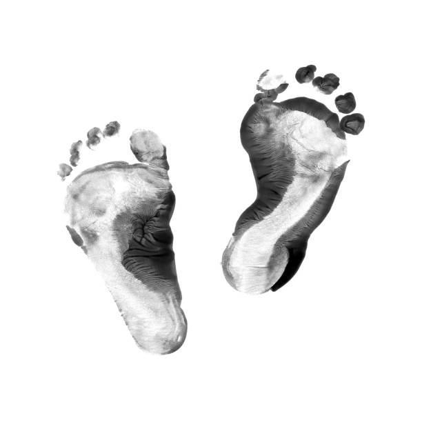 istock Baby foot prints with ink isolated on white background, top view. 2167237047