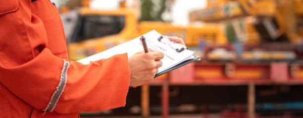 istock Operation supervisor is checking on heavy machine and equipment checklist 2167238935