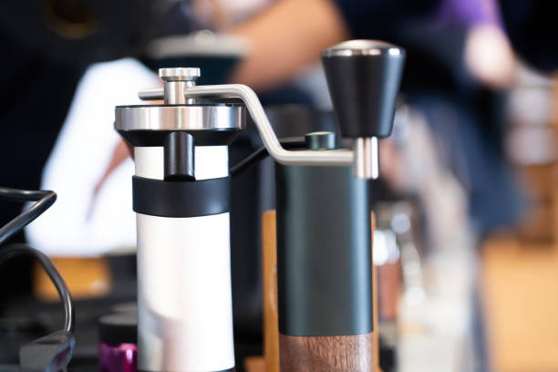 istock Hand coffee grinder, coffee grinder for drinking coffee on bokeh light background 2167247119