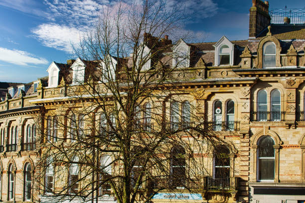 istock Vintage building corner against a dramatic cloudy sky in Harrogate, England. 2167247229