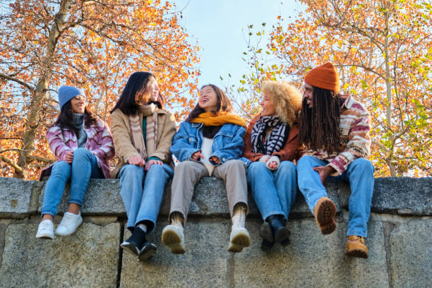 istock Group of multiracial friends hanging out. 2167249139