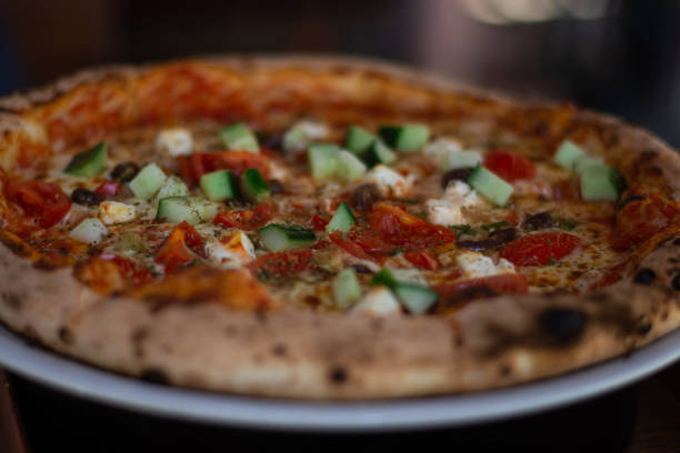 istock Close-up on delicious round pizza 2167250992