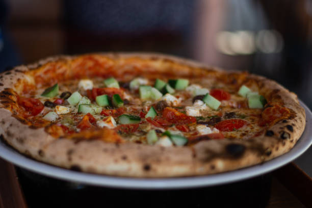 istock Close-up on delicious round pizza 2167251024