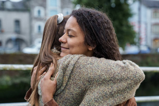 istock Two women hugging each other happily. 2167251641