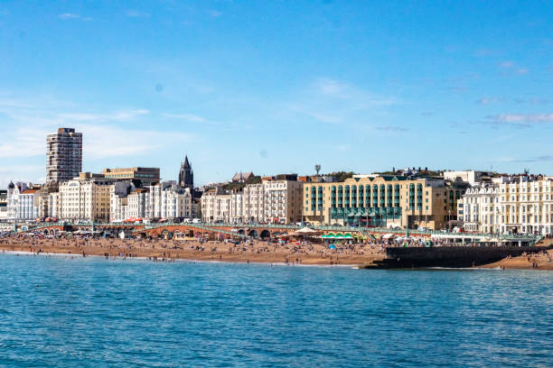 istock Brighton coastline with vibrant architecture and clear blue sky. 2167255316