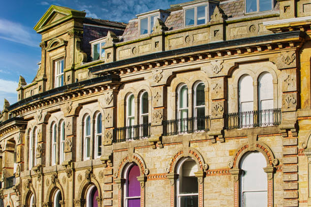 istock Vintage building corner against a dramatic cloudy sky in Harrogate, England. 2167255925