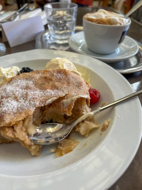 istock Delicious apple strudel with vanilla ice cream and fresh berries 2167261174
