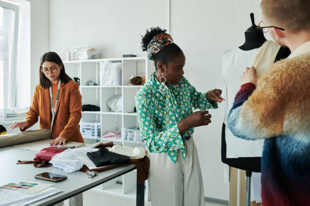 istock Creating attire in front of mannequin 2167270108