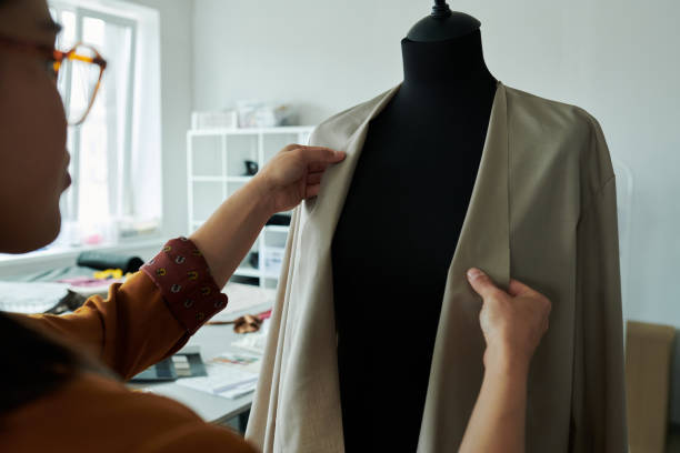 istock Trying new grey blazer on mannequin 2167270143