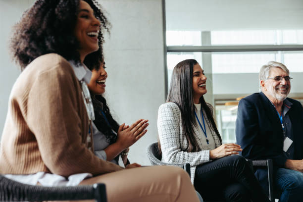 istock Diverse businesspeople networking and laughing at a corporate event 2167270853