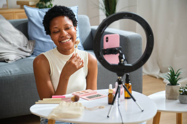 istock Beauty influencer making skin care video using jade roller 2167271266