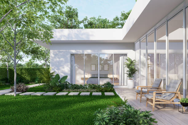istock Minimal style modern white house exterior with tropical garden 3d render 2167272551