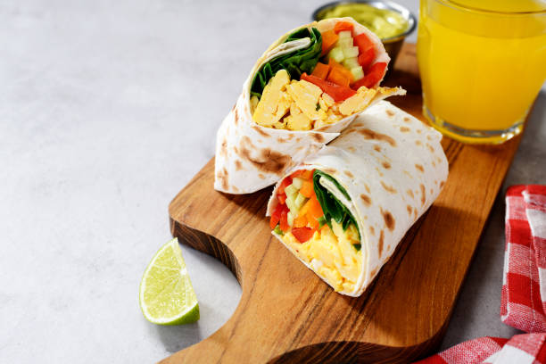 istock egg burrito with fresh vegetables and different sauces 2167276817