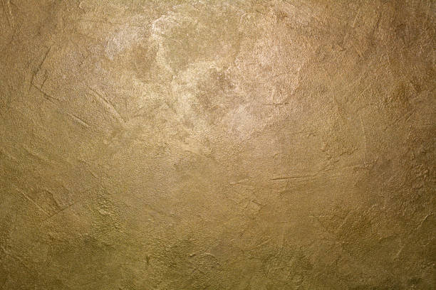 istock Golden wall texture. Yellow shining background 2167276852