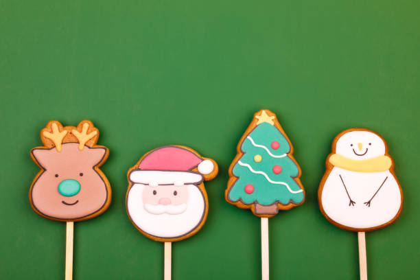 istock Christmas Themed Iced Cookies on Green Background 2167282545