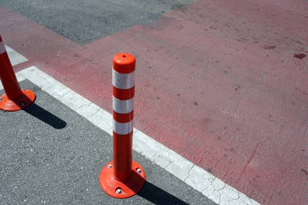 istock A red traffic cone on the street to protect walking. 2167282925