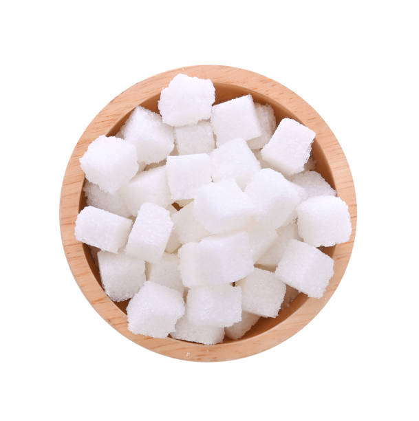 istock sugar cubes in wooden bowl isolated on white 2167284456