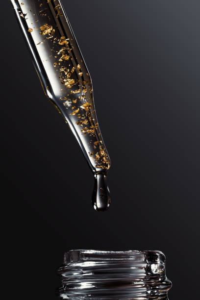 istock 24k gold serum drop in a bottle 2167284928