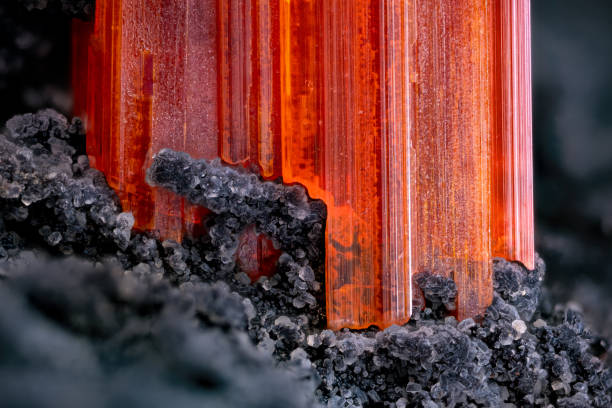 Crocoite crystal photography. Specimen from Adelaïde, dundas, tasmania, Australia. Micro photography extreme close-up. microscope mineral crystal photography for Scientific use.