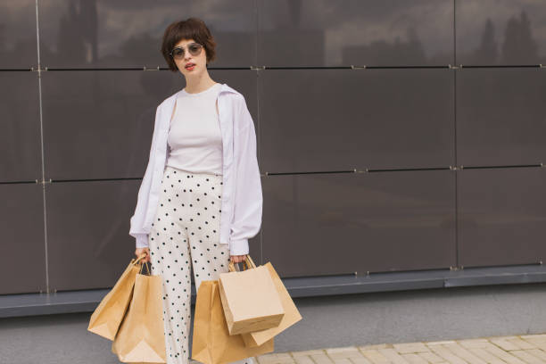 istock Woman with shopping bags. 2167286448