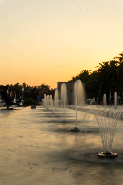 istock water fountains with a silk effect at sunset 2167289038