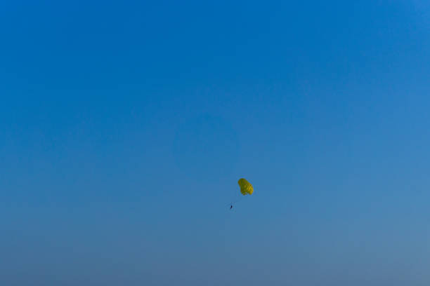 He flies through the sky, over the Swiss Alps