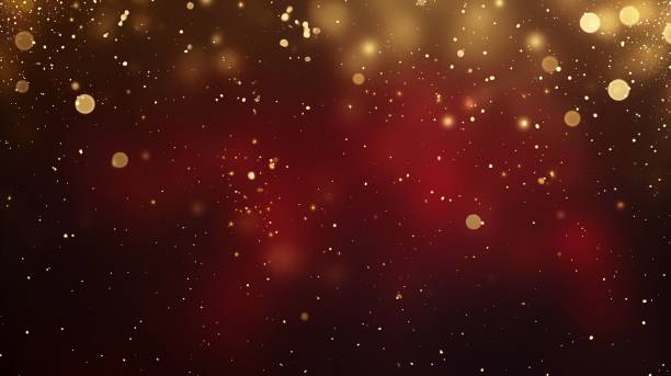 istock Abstract blurry background with dark red and yellow colors, and glowing particles 2167291079