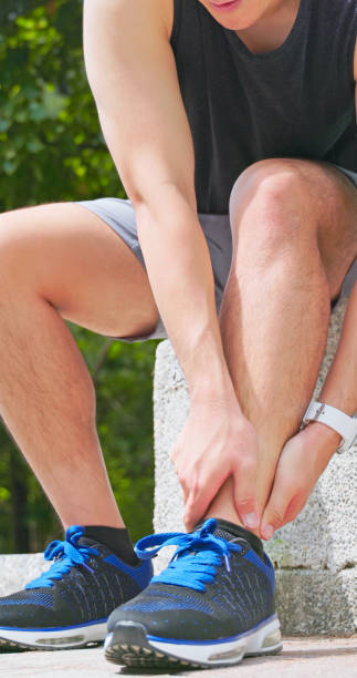 istock asian man sporting ankle injury 2167298762