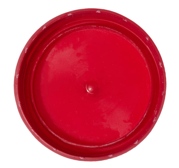istock Red plastic bottle cap on isolated background, top view 2167299751